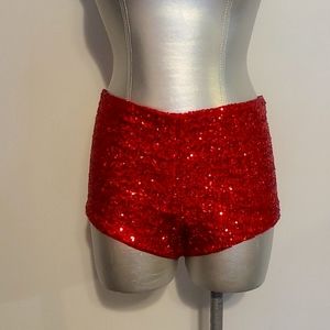 Hot red sequins hot shorts by Celb.designer Maggie Barry costom made.Size small